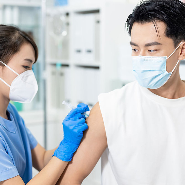 guy getting vaccinated